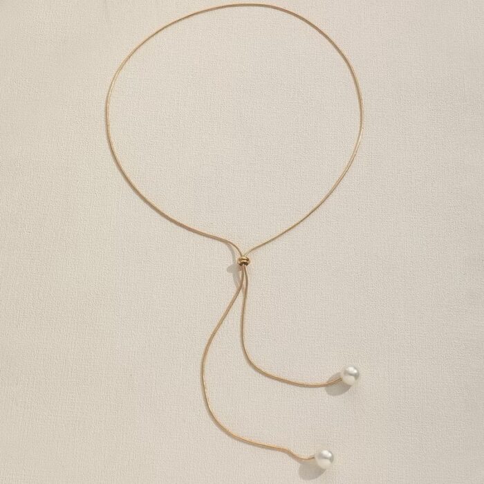Colar gravatinha pérola no dourado - Imagem 5