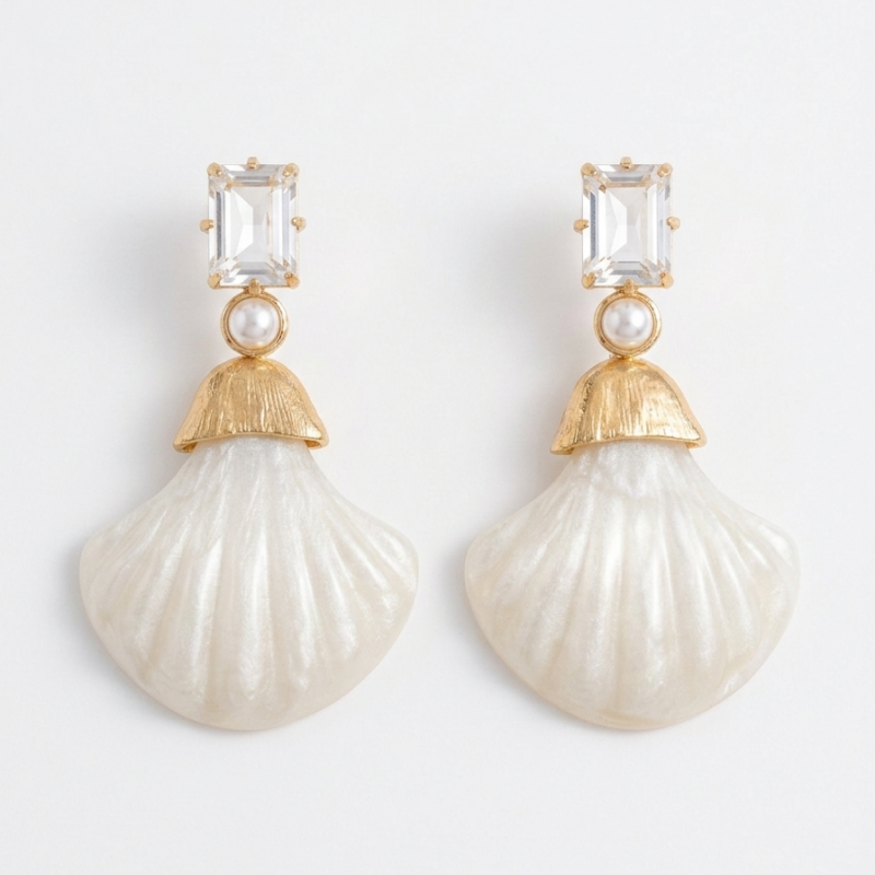 Brinco concha madrepérola de resina