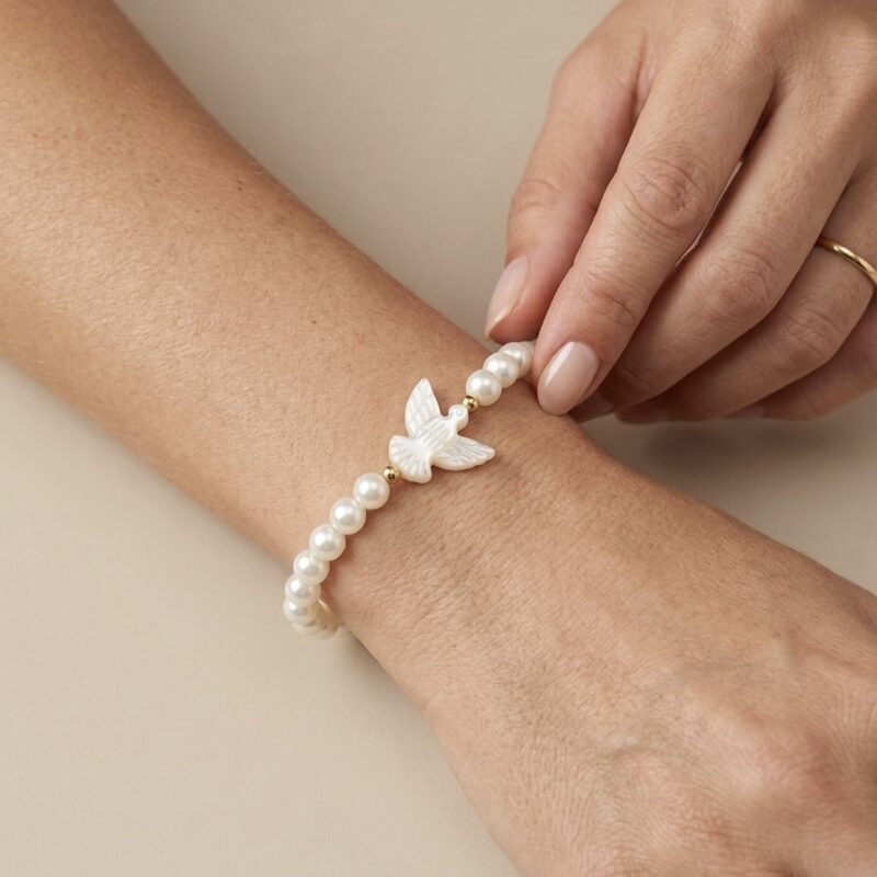 Pulseira de pérola com Espírito Santo pérola