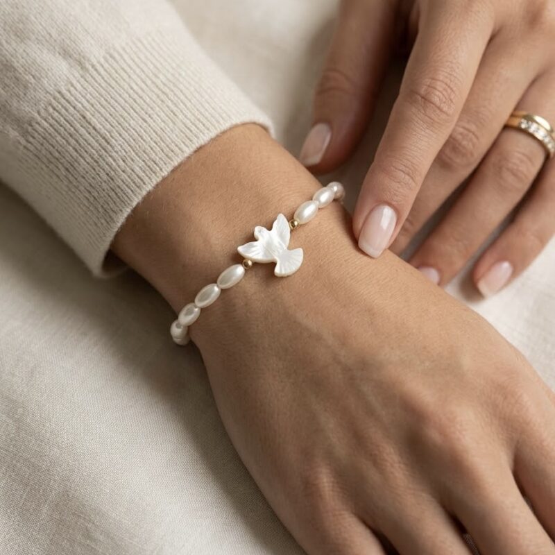 Pulseira pérola de arroz com Espírito Santo madrepérola