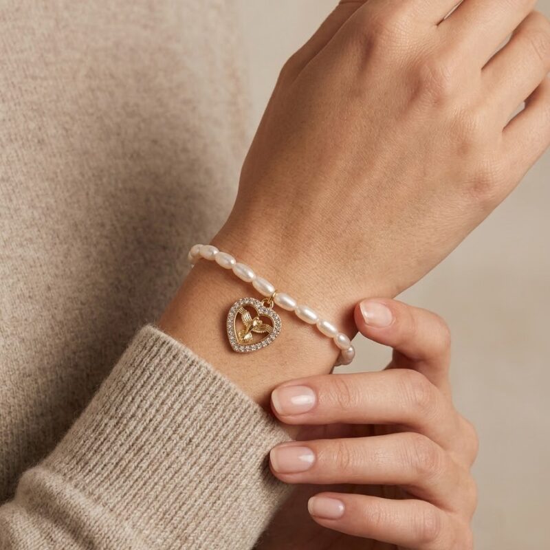 Pulseira pérola de arroz com Espírito Santo coração
